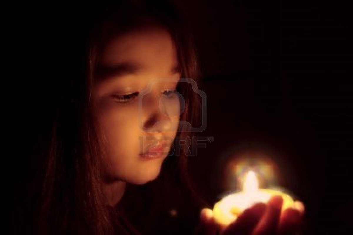 4366874-portrait-of-the-girl-with-a-candle-in-hands-the-spiritualised-face--mood-of-sacrament-and-revelation
