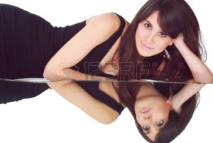 12797692-reflected-beautiful-model-with-two-expressions--smiling-in-main-image--but-sad-in-the-mirror--double